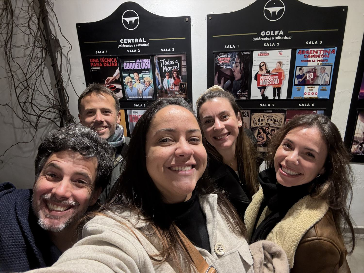 Group in front of the playbill